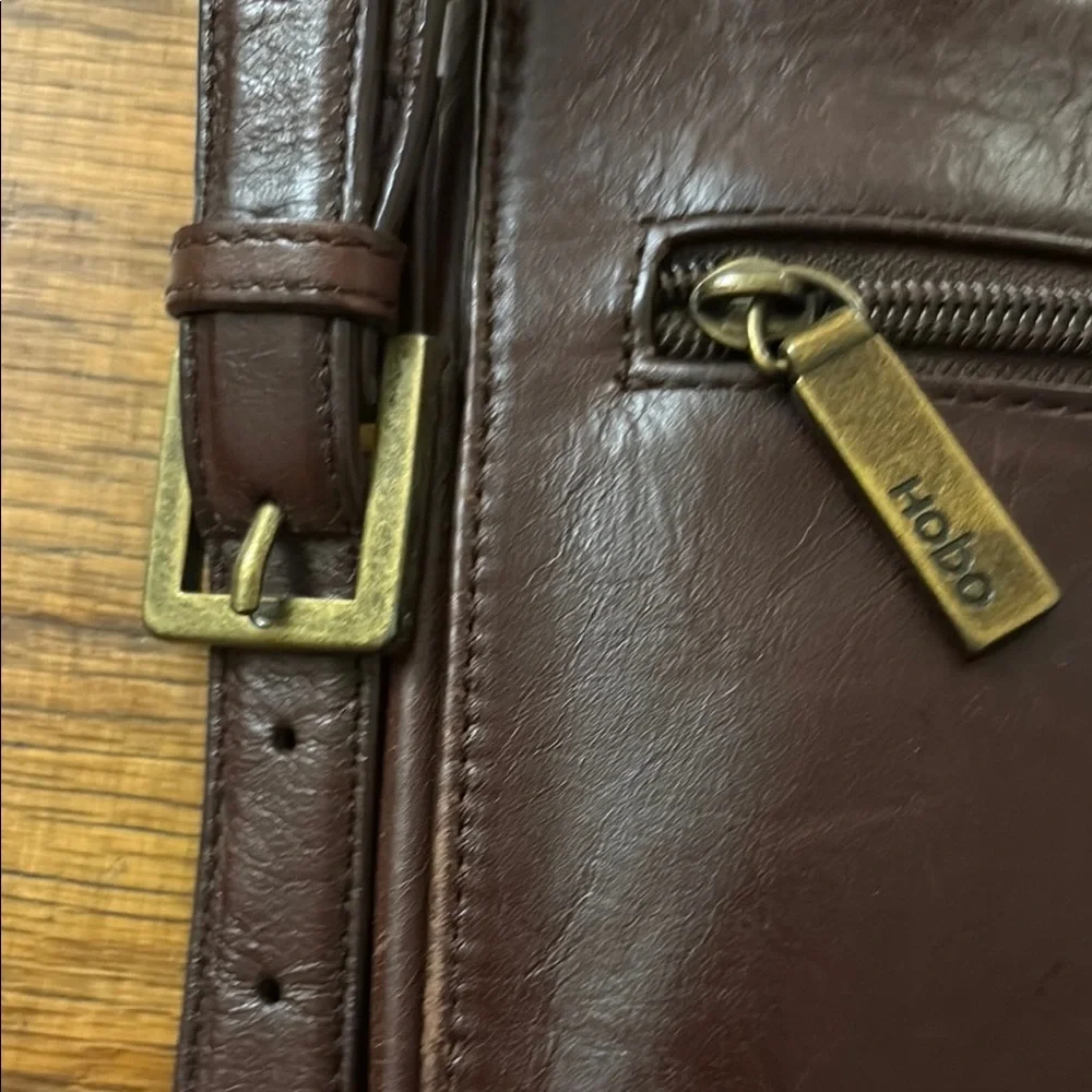 HOBO Brown Leather Messenger Bag with Minimalist Flap Design